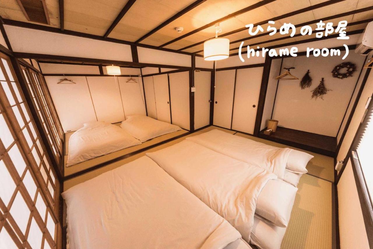 Book & Guesthouse Hitotomaru Тойоока Номер фото
